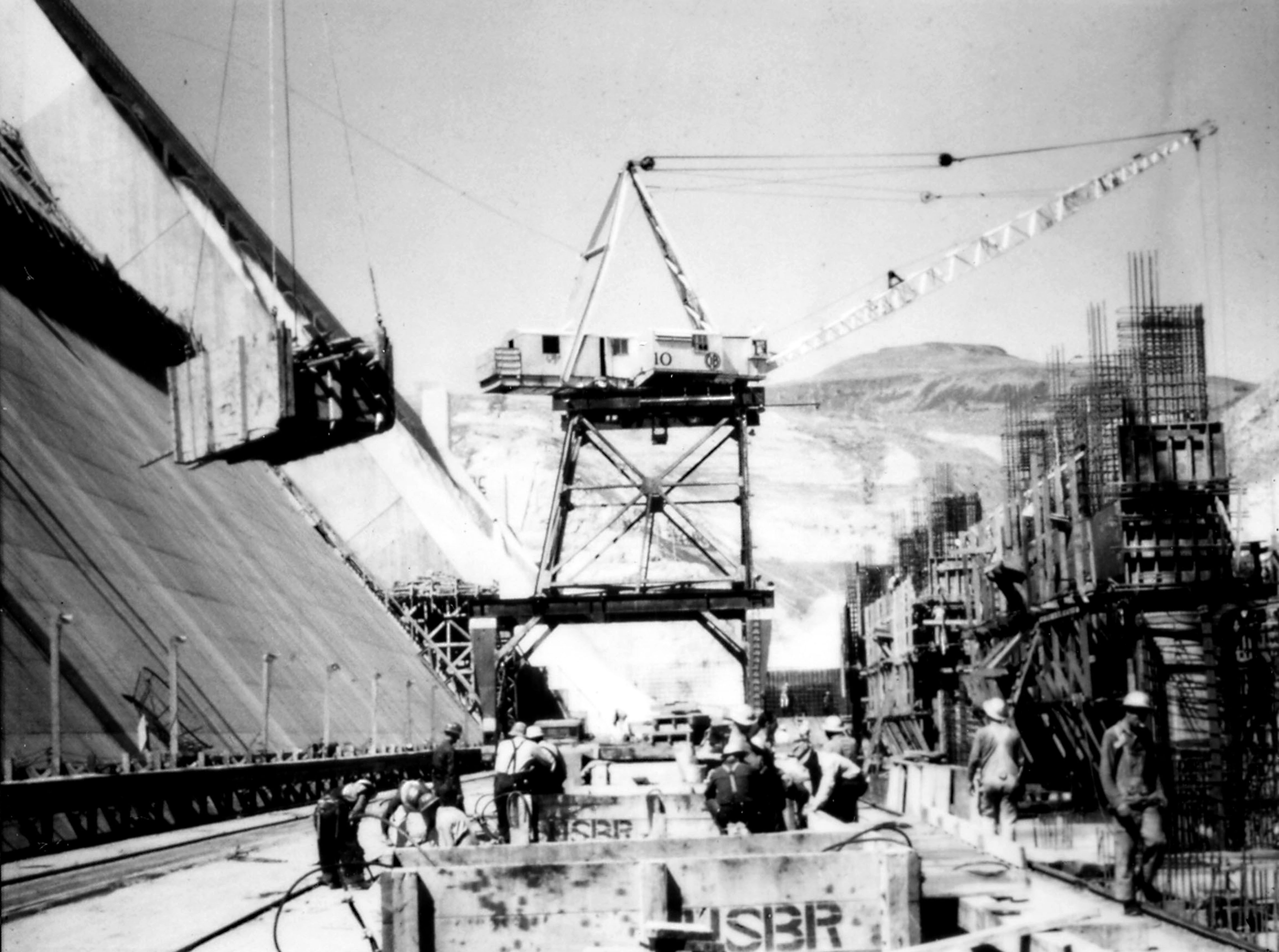 Photo taken July 1942. East side powerhouse work at Grand Coulee Dam.