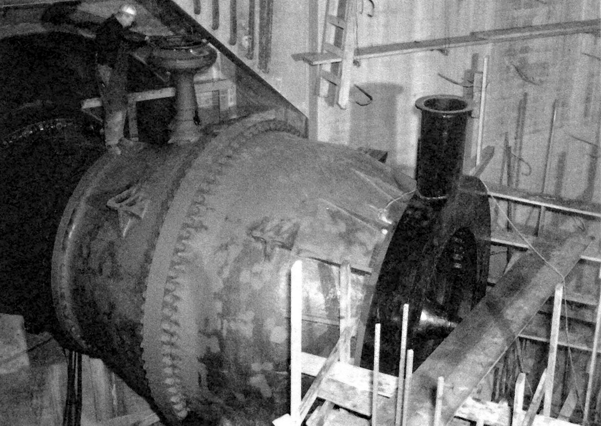 January 2, 1945. 84 inch needle valves are being installed in the east powerhouse at Grand Coulee Dam between the penstocks and draft tubes for water diversion.