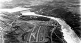 Mason City (Coulee Dam) in foreground with Engineers Town across river and Grand Coulee top center.