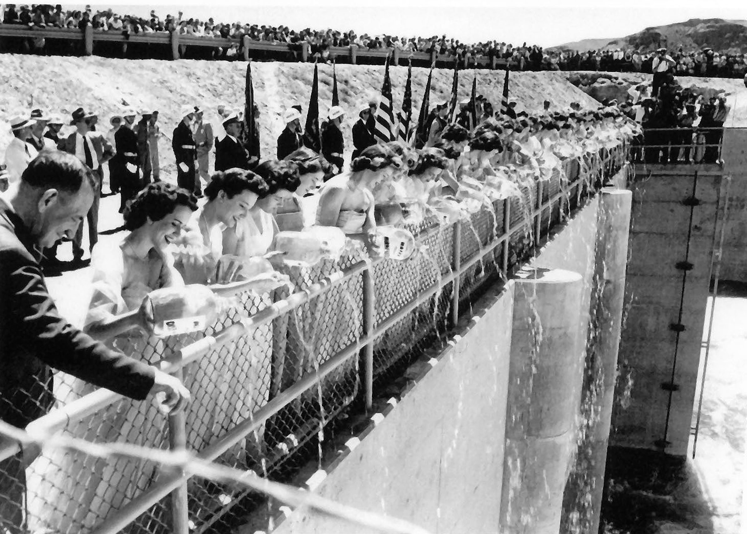 June 14, 1951. 50 maidens from 50 U.S. states at feeder canal ceremony at Grand Coulee Dam. Arizona only brought 1/2 gallon of water. Said California took the other half.