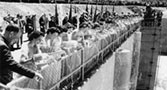 50 maidens from 50 U.S. states at feeder canal ceremony at Grand Coulee Dam. Arizona only brought 1/2 gallon of water. Said California took the other half.