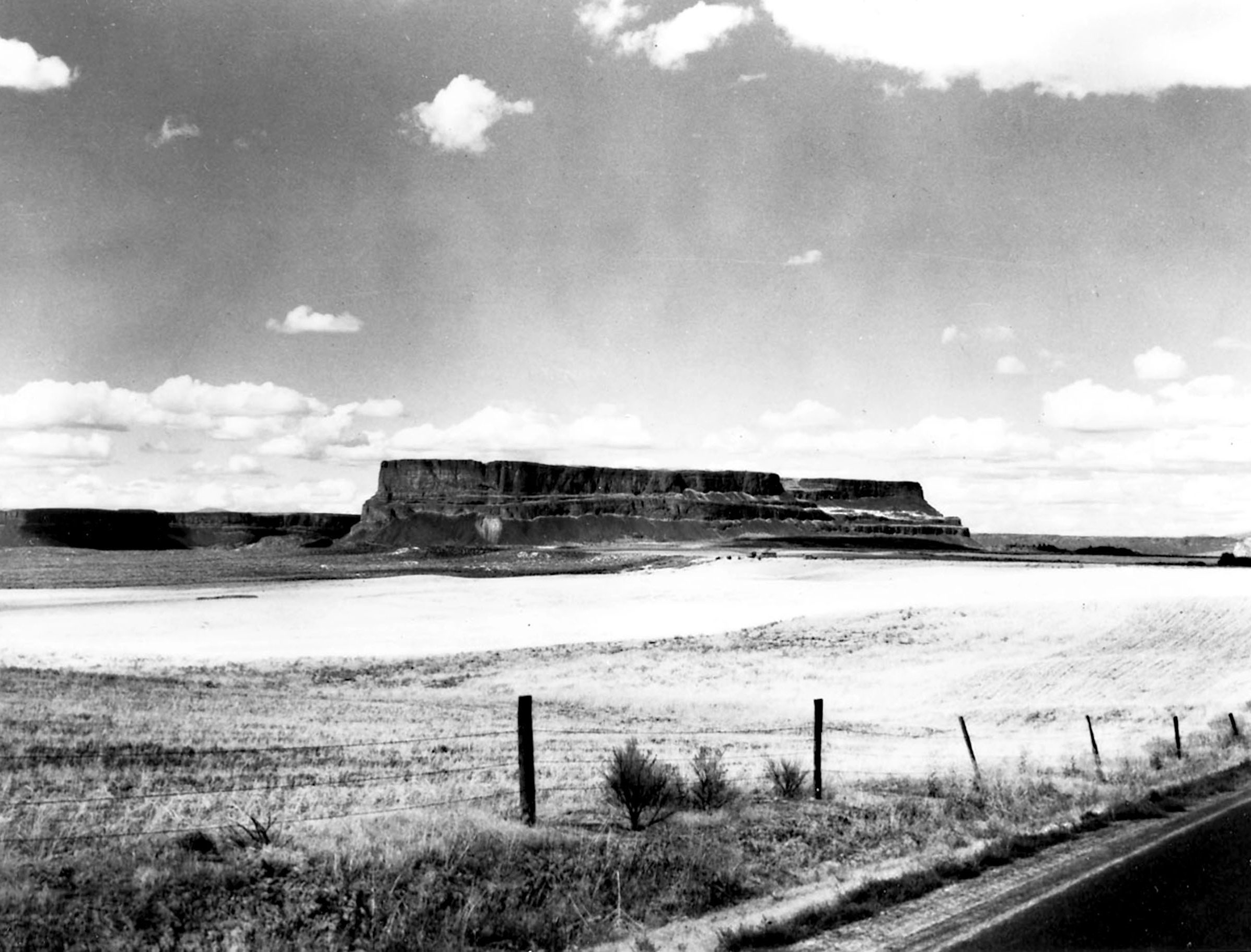 Photo taken August 15, 1944. Steamboat Rock in the upper Grand Coulee. This coulee will be the balancing reservoir for the Columbia Basin Irrigation Project.