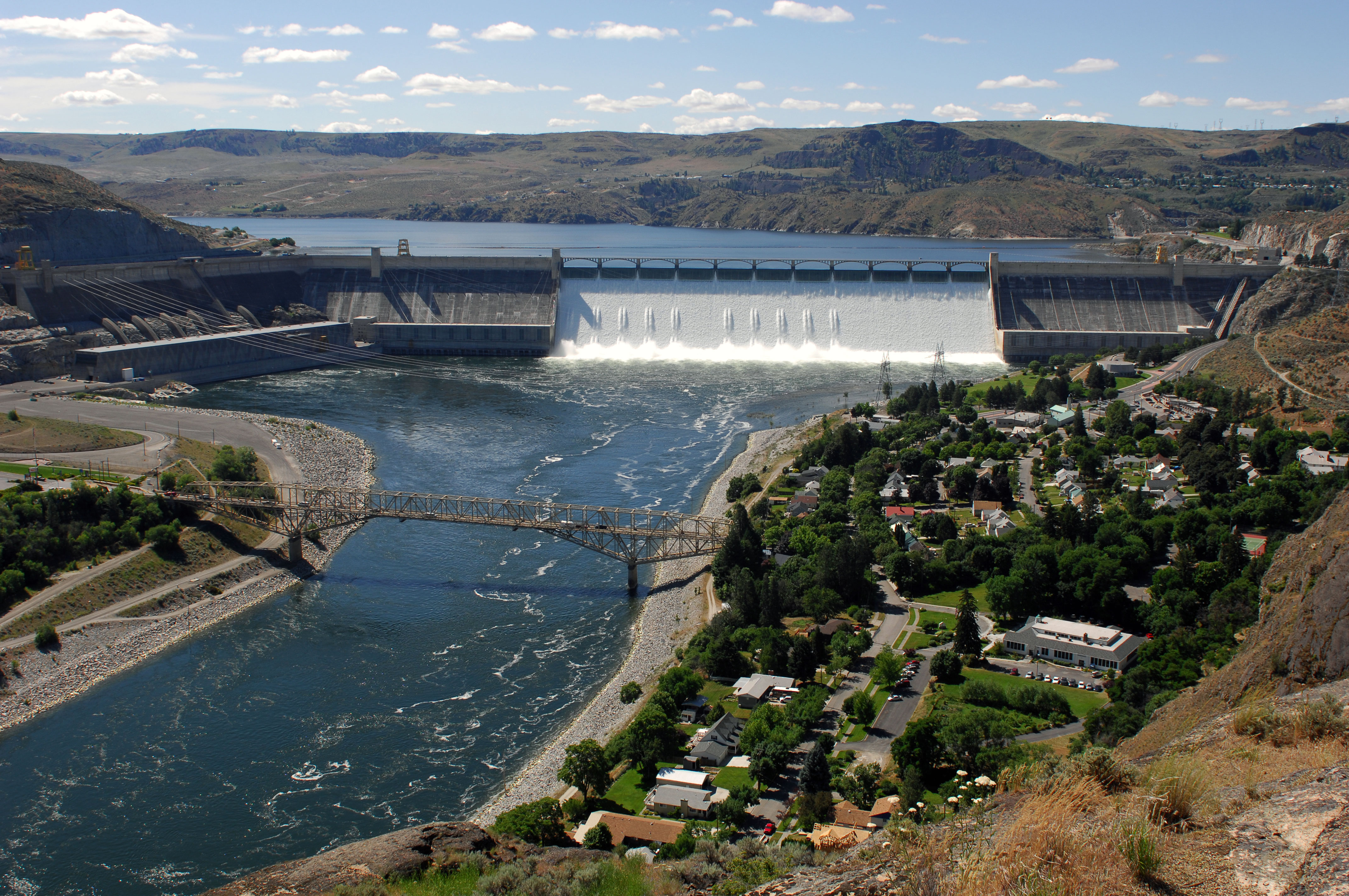 June 30, 2011. Grand Coulee Dam operators released over 200,000 cfs downstream during an unusually large and late spring runoff. The spillway is carrying 33,800 cfs, while 167,000 cfs through the hydropower generators.