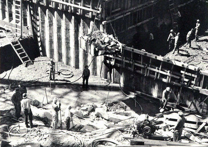 Over 15 million cubic yards of earth and rock are removed from the dam site.