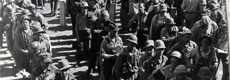 People waiting in line to get paycheck.