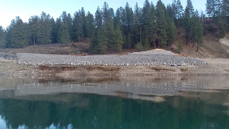 Marble Beach stabilization when Lake Roosevelt was 37 feet below full pool level for spring flood control. Under these conditions, the now-protected sensitive resources are no longer exposed to destructive natural and human impacts.
