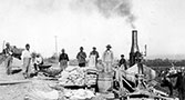 Workers for construction of the New York (Main) Canal; view of Boise, Idaho in background. c. 1911