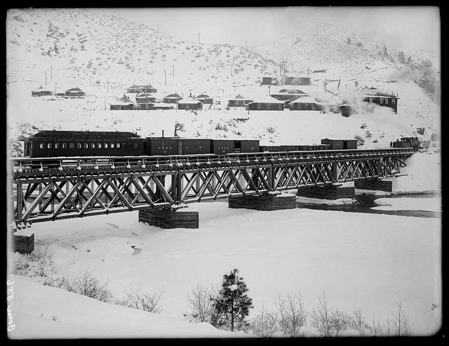 U.S.R.S. train crossing bridge and arriving at Arrowrock.