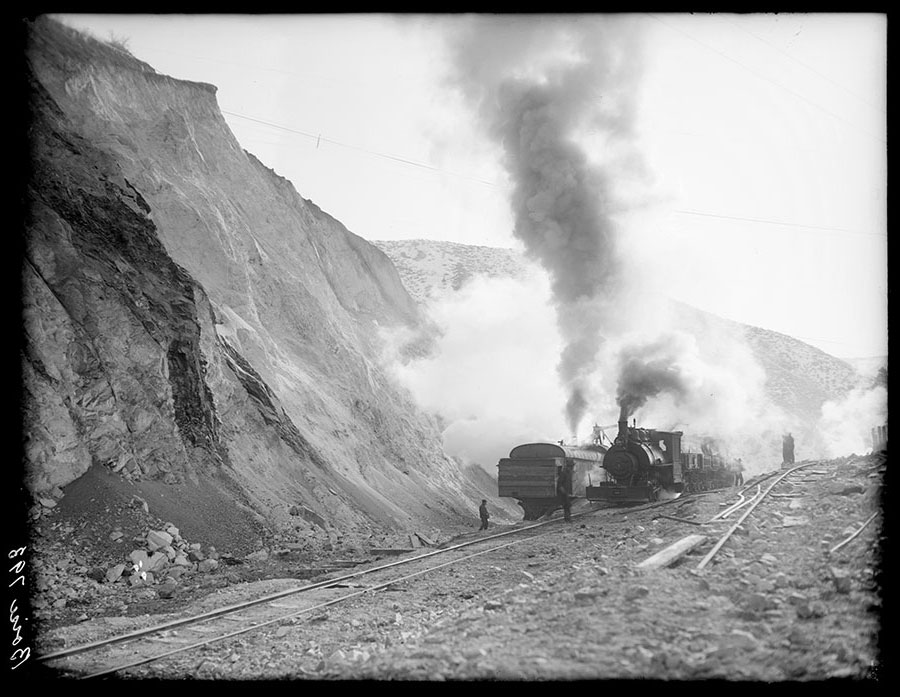 Arrowrock dam. Excavation on north side of spillway. Steam shovel work.