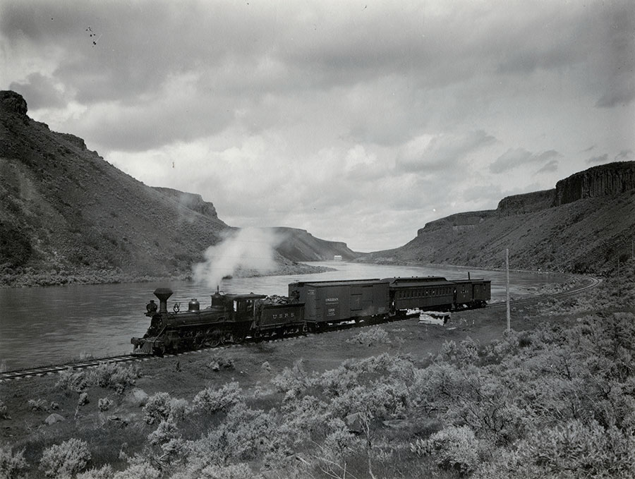 U.S.R.S. Train on way to Arrowrock damsite with Boise River Diversion Dam in background.