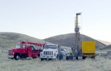 December 6, 2003 Drill crew working on south side of State Highway 24. Test holes will determine depth to bedrock, which will affect design, construction, and cost.