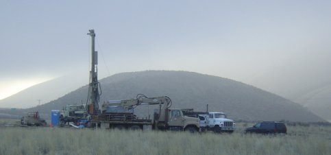 February 2004. View of the drill setup on DH-04 at the alternative dam site. Horse Thief Point is in the background.