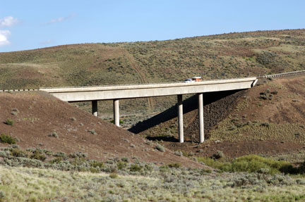 May 2007: Eastbound I-82 bridge at Lmuma Creek looking southeast. This is near the upper end of the proposed Wymer Reservoir. The water surface would be approximately 12 feet below the bottom of the bridge.