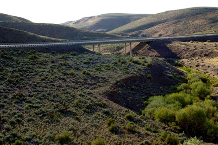 May 2007: Westbound Interstate 82 bridge at Lmuma Creek looking west. This is at the upper end of the proposed Wymer Reservoir. The normal water surface will be approximately 30 feet below the bottom of the bridge. 