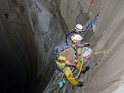 photo: Rope access team doing repairs inside Flaming Gorge Dam spillway tunnel