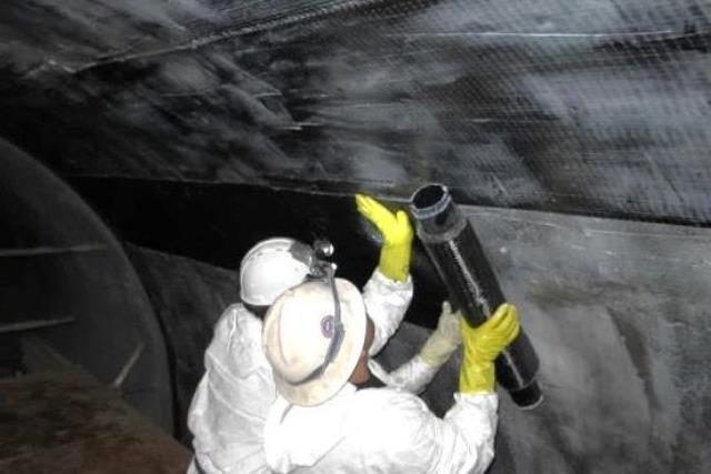  Photo of FRP composite repair of a pipeline interior