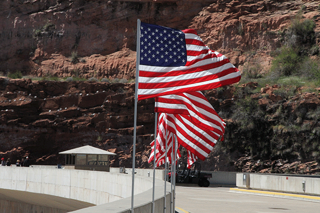 American flags lining Glen Canyon Dam to commemorate the reopening of the Carl Hayden Visitor Center 