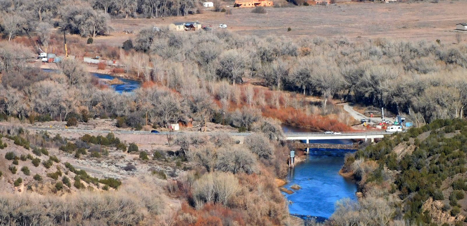 Aerial photo showing Pojoaque Basin Regional Water System collector well construction near the Rio Grande on San Ildefonso Pueblo. 