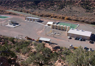 Paradox Valley Unit showing several pools of water and cylindrical buildings